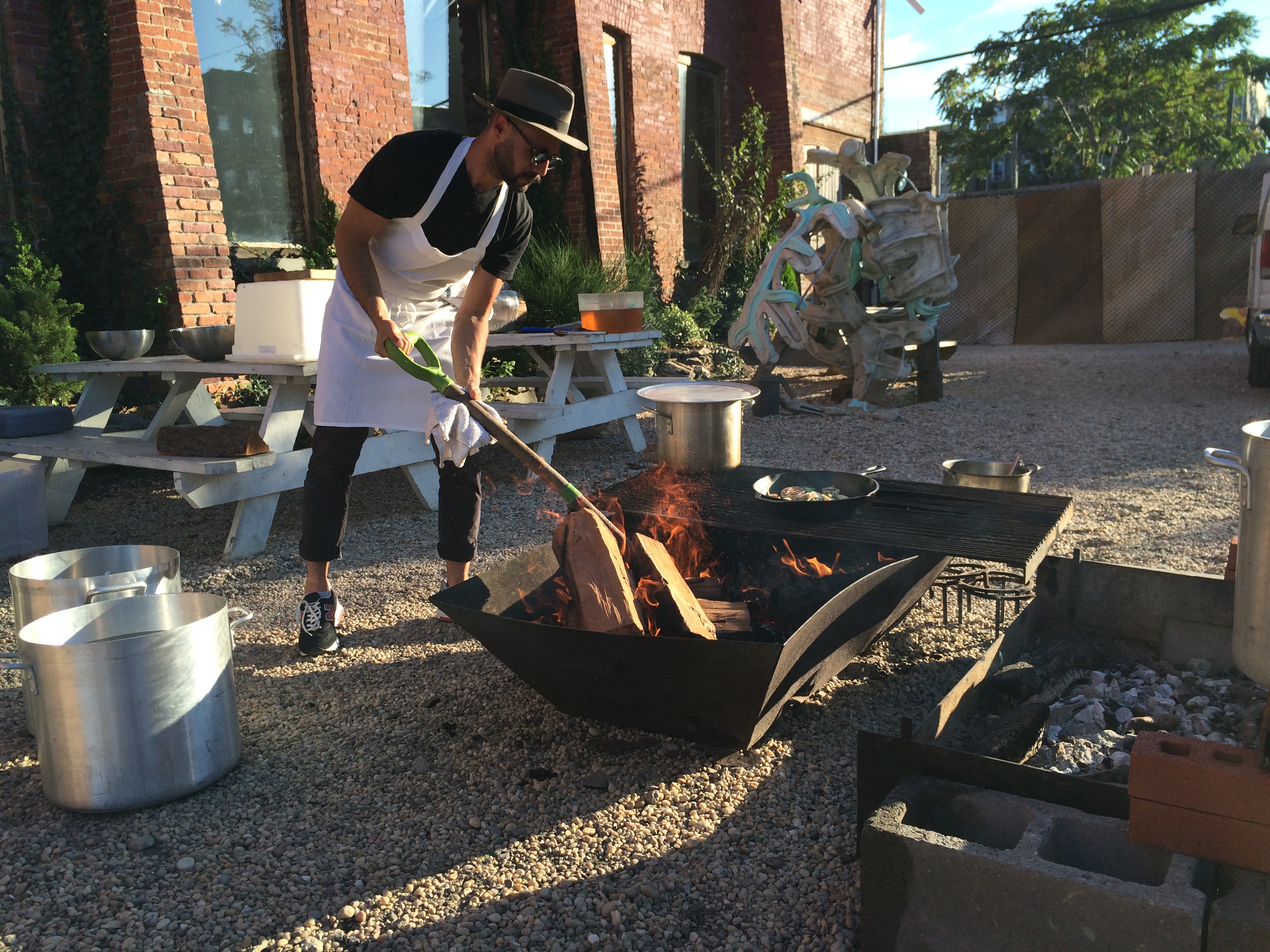 Jaime cooking over open fire